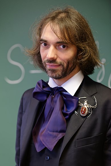 390px-Cedric_Villani_at_his_office_2015_n3